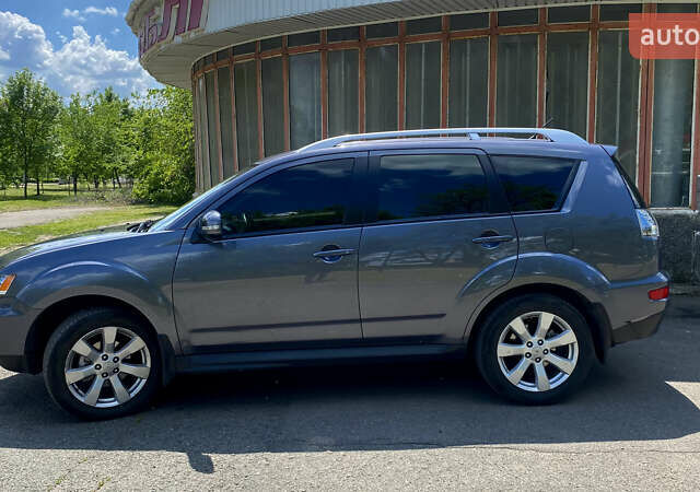 Сірий Міцубісі Аутлендер ХЛ, об'ємом двигуна 2.4 л та пробігом 126 тис. км за 11200 $, фото 2 на Automoto.ua