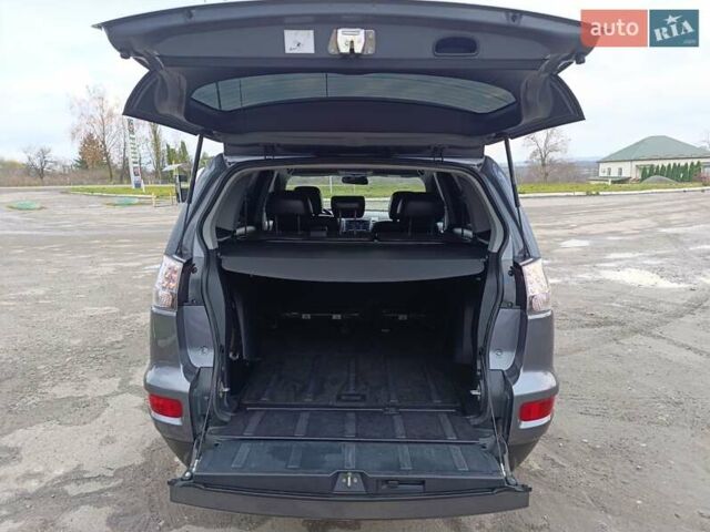 Серый Мицубиси Аутлендер ХЛ, объемом двигателя 2.3 л и пробегом 289 тыс. км за 10333 $, фото 36 на Automoto.ua