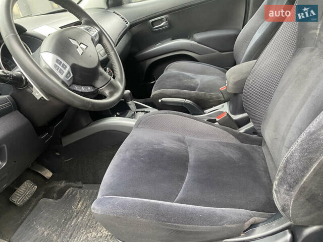 Серый Мицубиси Аутлендер ХЛ, объемом двигателя 2.4 л и пробегом 182 тыс. км за 9800 $, фото 17 на Automoto.ua