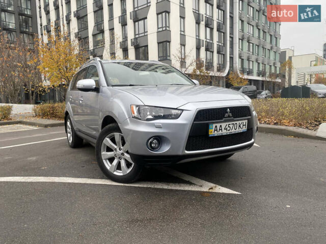 Серый Мицубиси Аутлендер ХЛ, объемом двигателя 2.4 л и пробегом 182 тыс. км за 9800 $, фото 4 на Automoto.ua