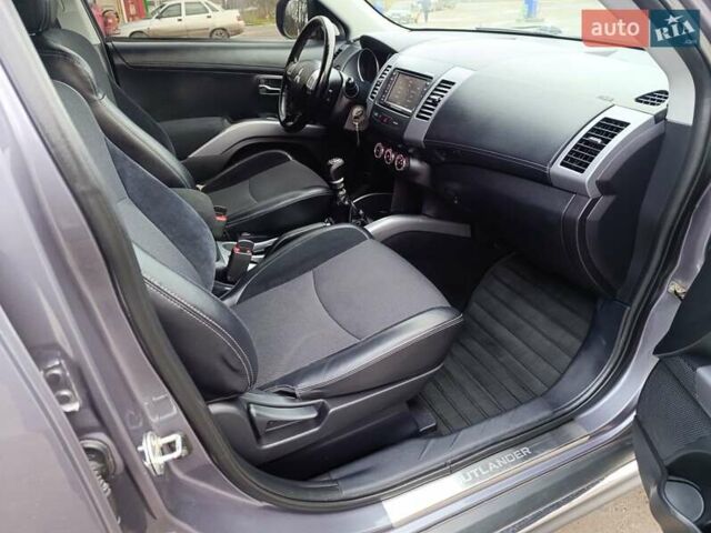 Серый Мицубиси Аутлендер ХЛ, объемом двигателя 2.3 л и пробегом 289 тыс. км за 10333 $, фото 28 на Automoto.ua