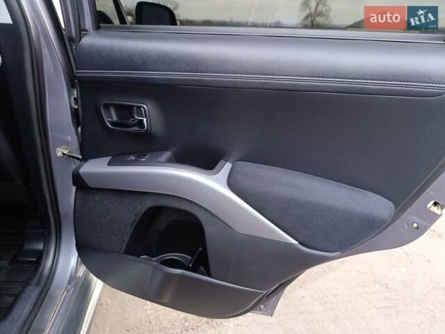 Серый Мицубиси Аутлендер ХЛ, объемом двигателя 2.3 л и пробегом 289 тыс. км за 10333 $, фото 34 на Automoto.ua