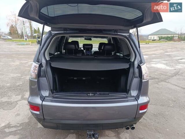 Серый Мицубиси Аутлендер ХЛ, объемом двигателя 2.3 л и пробегом 289 тыс. км за 10333 $, фото 39 на Automoto.ua