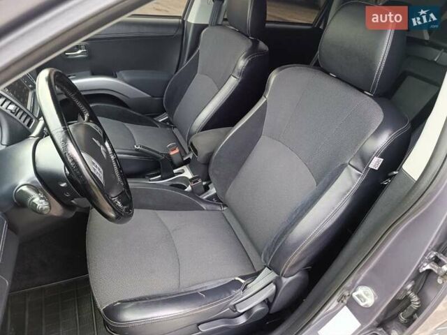 Серый Мицубиси Аутлендер ХЛ, объемом двигателя 2.3 л и пробегом 289 тыс. км за 10333 $, фото 18 на Automoto.ua