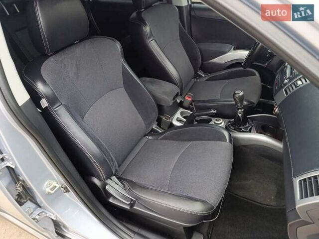 Серый Мицубиси Аутлендер ХЛ, объемом двигателя 2 л и пробегом 209 тыс. км за 9555 $, фото 28 на Automoto.ua