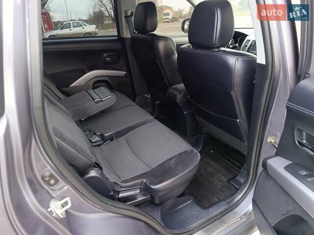 Серый Мицубиси Аутлендер ХЛ, объемом двигателя 2.3 л и пробегом 289 тыс. км за 10333 $, фото 35 на Automoto.ua