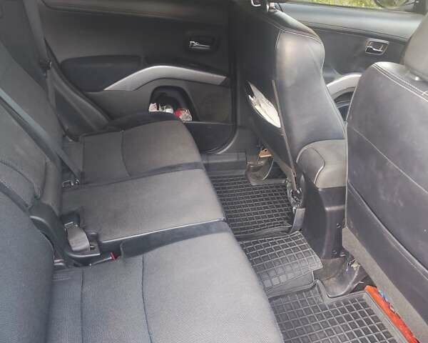 Серый Мицубиси Аутлендер ХЛ, объемом двигателя 2.36 л и пробегом 235 тыс. км за 10800 $, фото 11 на Automoto.ua