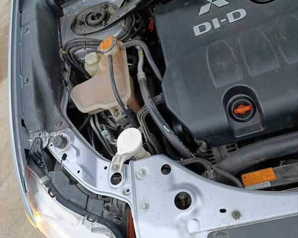 Серый Мицубиси Аутлендер ХЛ, объемом двигателя 2 л и пробегом 209 тыс. км за 9555 $, фото 40 на Automoto.ua