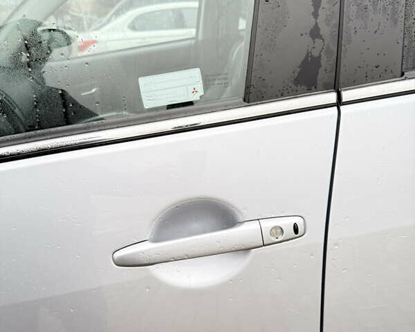 Сірий Міцубісі Аутлендер ХЛ, об'ємом двигуна 2.2 л та пробігом 259 тис. км за 11500 $, фото 5 на Automoto.ua