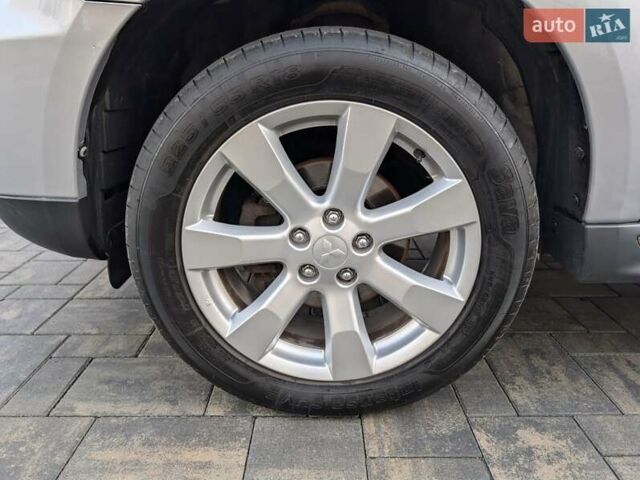 Сірий Міцубісі Аутлендер ХЛ, об'ємом двигуна 2.2 л та пробігом 266 тис. км за 11250 $, фото 23 на Automoto.ua