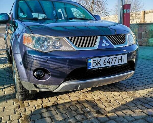 Синій Міцубісі Аутлендер ХЛ, об'ємом двигуна 2.2 л та пробігом 300 тис. км за 9500 $, фото 7 на Automoto.ua