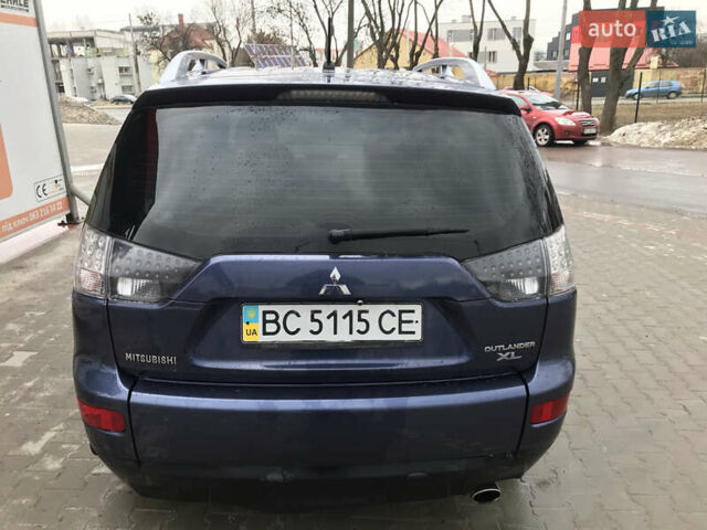 Синий Мицубиси Аутлендер ХЛ, объемом двигателя 2.4 л и пробегом 295 тыс. км за 7600 $, фото 2 на Automoto.ua