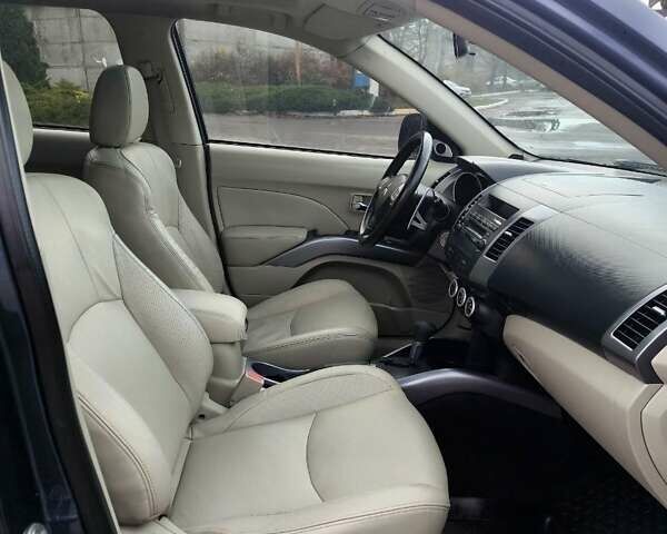 Синий Мицубиси Аутлендер ХЛ, объемом двигателя 3 л и пробегом 197 тыс. км за 9200 $, фото 19 на Automoto.ua