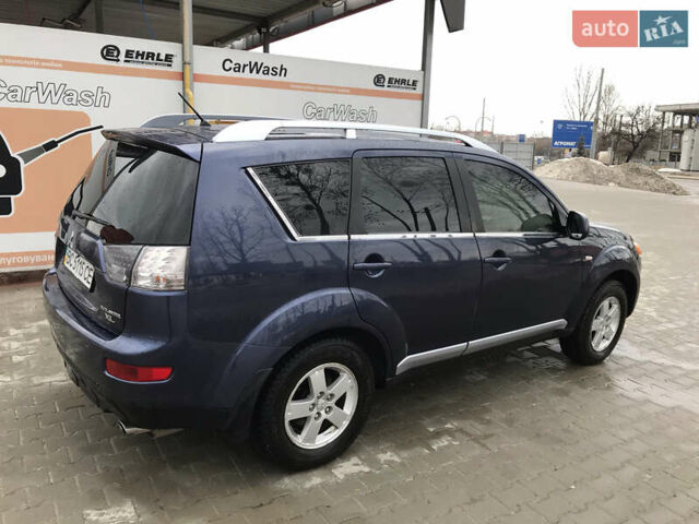 Синий Мицубиси Аутлендер ХЛ, объемом двигателя 2.4 л и пробегом 295 тыс. км за 7600 $, фото 3 на Automoto.ua