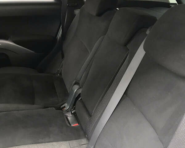 Синий Мицубиси Аутлендер ХЛ, объемом двигателя 2.4 л и пробегом 295 тыс. км за 7600 $, фото 9 на Automoto.ua