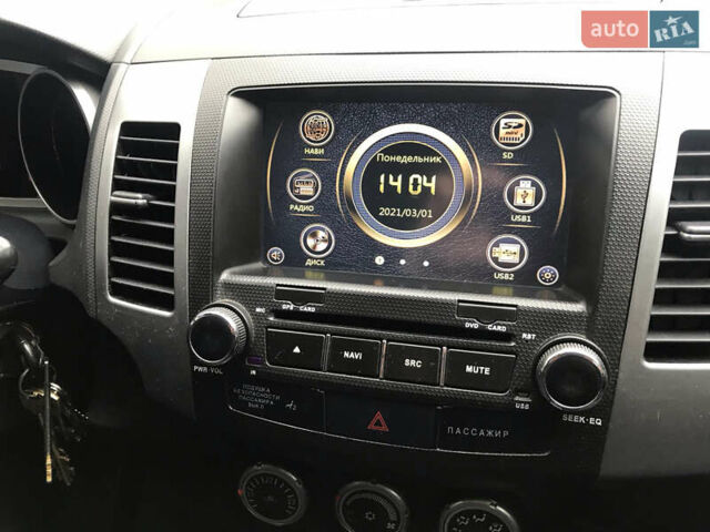 Синий Мицубиси Аутлендер ХЛ, объемом двигателя 2.4 л и пробегом 295 тыс. км за 7600 $, фото 5 на Automoto.ua