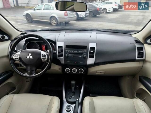 Синий Мицубиси Аутлендер ХЛ, объемом двигателя 3 л и пробегом 197 тыс. км за 9200 $, фото 22 на Automoto.ua