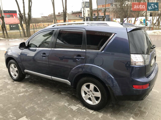 Синий Мицубиси Аутлендер ХЛ, объемом двигателя 2.4 л и пробегом 295 тыс. км за 7600 $, фото 4 на Automoto.ua