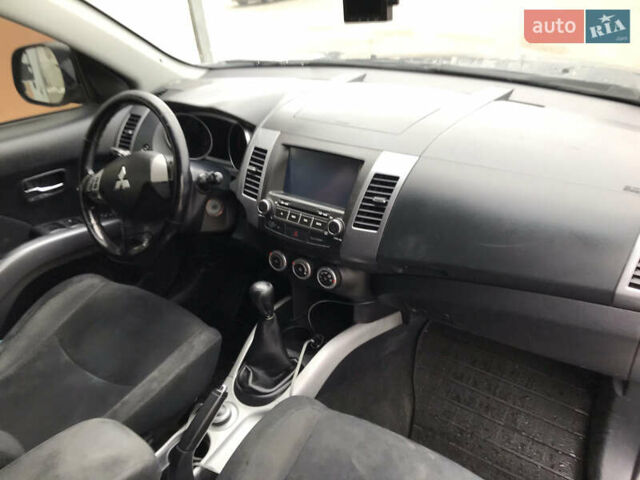 Синий Мицубиси Аутлендер ХЛ, объемом двигателя 2.4 л и пробегом 295 тыс. км за 7600 $, фото 11 на Automoto.ua