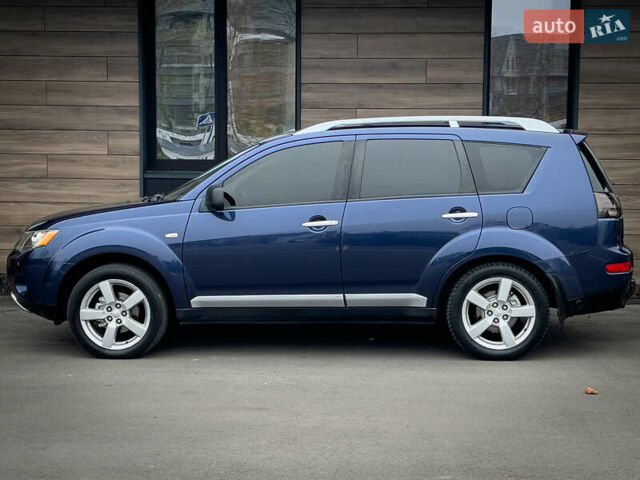 Синий Мицубиси Аутлендер ХЛ, объемом двигателя 2.4 л и пробегом 249 тыс. км за 8800 $, фото 5 на Automoto.ua