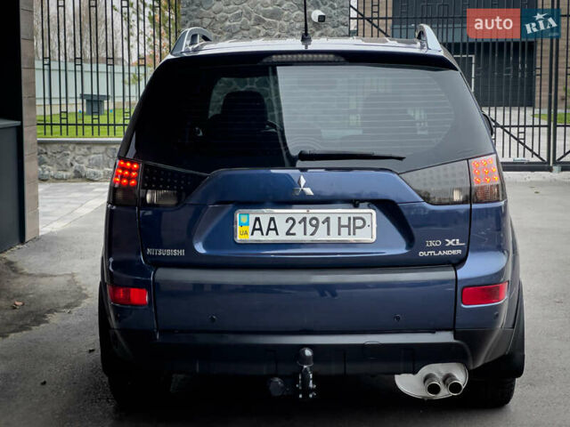 Синий Мицубиси Аутлендер ХЛ, объемом двигателя 2.4 л и пробегом 249 тыс. км за 8800 $, фото 8 на Automoto.ua