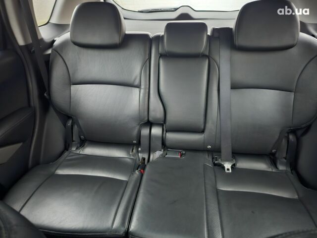 Синий Мицубиси Аутлендер ХЛ, объемом двигателя 2.4 л и пробегом 282 тыс. км за 9500 $, фото 6 на Automoto.ua