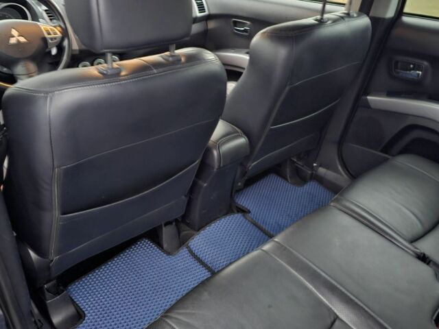 Синий Мицубиси Аутлендер ХЛ, объемом двигателя 2.4 л и пробегом 282 тыс. км за 9500 $, фото 7 на Automoto.ua