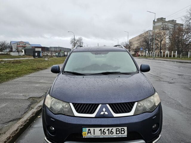Синий Мицубиси Аутлендер ХЛ, объемом двигателя 2.4 л и пробегом 282 тыс. км за 9500 $, фото 12 на Automoto.ua