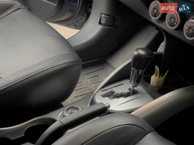 Синий Мицубиси Аутлендер ХЛ, объемом двигателя 2.4 л и пробегом 249 тыс. км за 8800 $, фото 22 на Automoto.ua