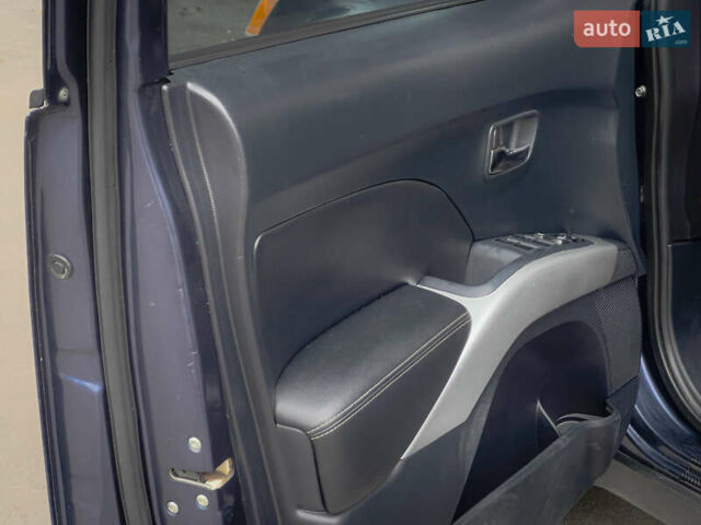 Синий Мицубиси Аутлендер ХЛ, объемом двигателя 2.4 л и пробегом 249 тыс. км за 8800 $, фото 15 на Automoto.ua