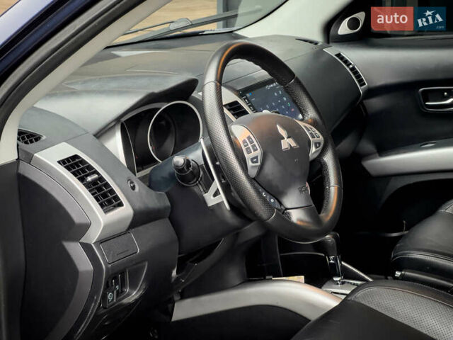 Синий Мицубиси Аутлендер ХЛ, объемом двигателя 2.4 л и пробегом 249 тыс. км за 8800 $, фото 14 на Automoto.ua