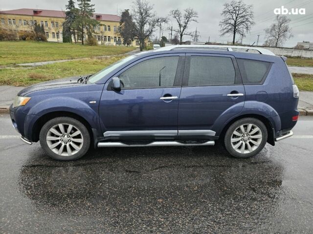Синий Мицубиси Аутлендер ХЛ, объемом двигателя 2.4 л и пробегом 282 тыс. км за 9500 $, фото 5 на Automoto.ua