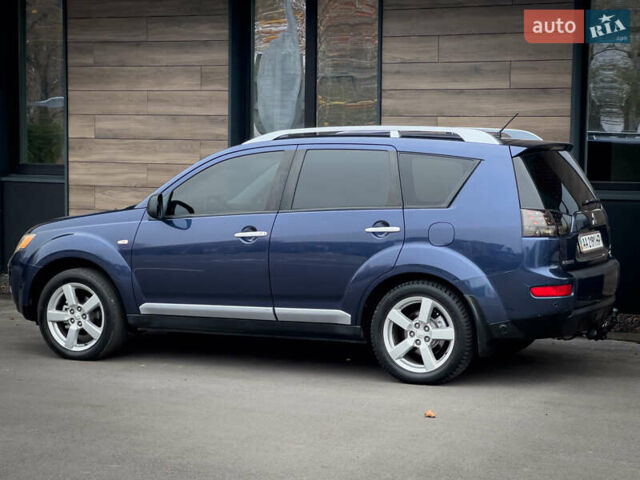 Синий Мицубиси Аутлендер ХЛ, объемом двигателя 2.4 л и пробегом 249 тыс. км за 8800 $, фото 6 на Automoto.ua
