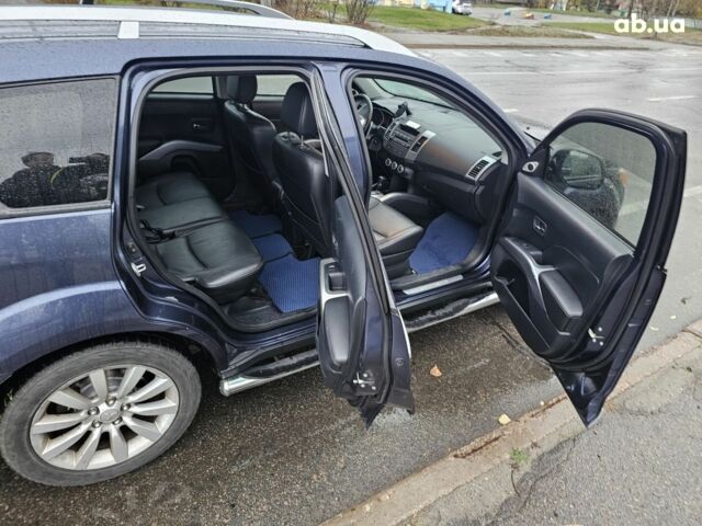 Синий Мицубиси Аутлендер ХЛ, объемом двигателя 2.4 л и пробегом 282 тыс. км за 9500 $, фото 10 на Automoto.ua