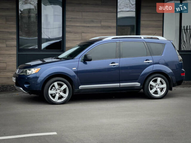 Синий Мицубиси Аутлендер ХЛ, объемом двигателя 2.4 л и пробегом 249 тыс. км за 8800 $, фото 4 на Automoto.ua