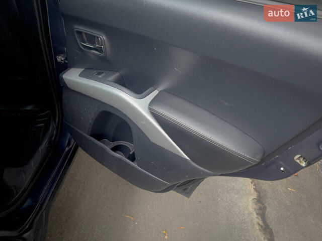 Синий Мицубиси Аутлендер ХЛ, объемом двигателя 2.4 л и пробегом 249 тыс. км за 8800 $, фото 19 на Automoto.ua