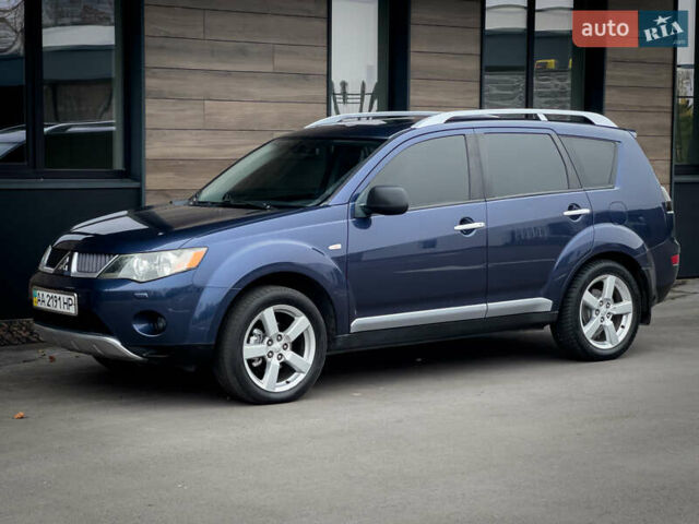 Синий Мицубиси Аутлендер ХЛ, объемом двигателя 2.4 л и пробегом 249 тыс. км за 8800 $, фото 3 на Automoto.ua