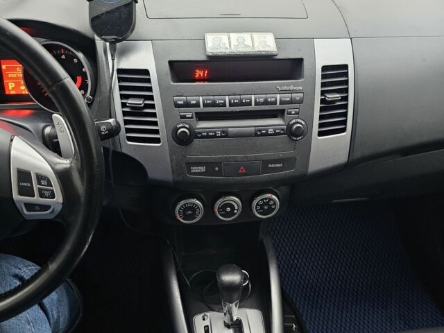 Синий Мицубиси Аутлендер ХЛ, объемом двигателя 2.4 л и пробегом 282 тыс. км за 9500 $, фото 11 на Automoto.ua