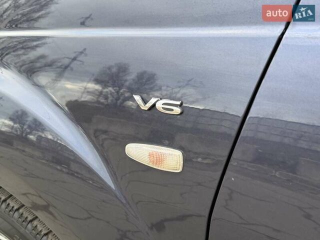 Синий Мицубиси Аутлендер ХЛ, объемом двигателя 3 л и пробегом 180 тыс. км за 9900 $, фото 10 на Automoto.ua