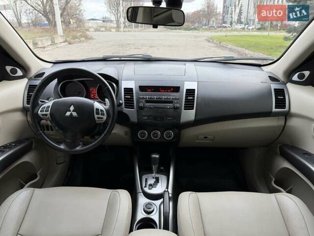 Синий Мицубиси Аутлендер ХЛ, объемом двигателя 3 л и пробегом 180 тыс. км за 9900 $, фото 15 на Automoto.ua