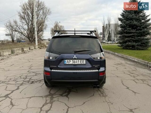 Синий Мицубиси Аутлендер ХЛ, объемом двигателя 3 л и пробегом 180 тыс. км за 9900 $, фото 6 на Automoto.ua