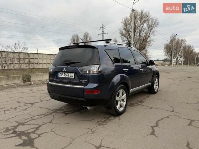 Синий Мицубиси Аутлендер ХЛ, объемом двигателя 3 л и пробегом 180 тыс. км за 9900 $, фото 5 на Automoto.ua