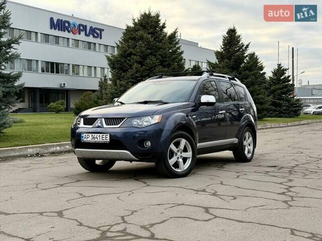 Синий Мицубиси Аутлендер ХЛ, объемом двигателя 3 л и пробегом 180 тыс. км за 9900 $, фото 1 на Automoto.ua