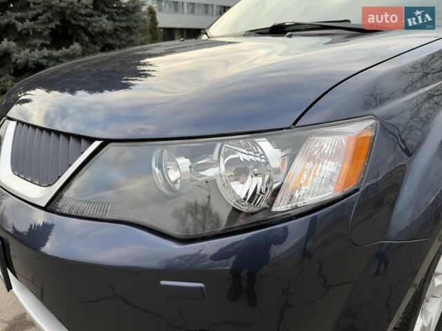 Синий Мицубиси Аутлендер ХЛ, объемом двигателя 3 л и пробегом 180 тыс. км за 9900 $, фото 11 на Automoto.ua