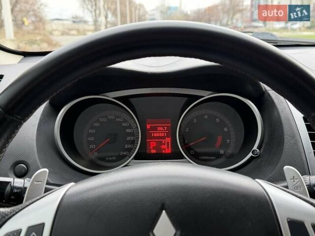 Синий Мицубиси Аутлендер ХЛ, объемом двигателя 3 л и пробегом 180 тыс. км за 9900 $, фото 25 на Automoto.ua