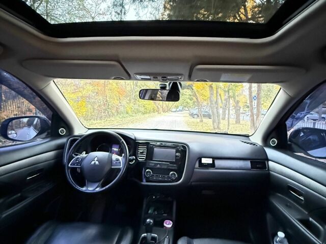 Белый Мицубиси Аутлендер, объемом двигателя 2.4 л и пробегом 146 тыс. км за 13500 $, фото 14 на Automoto.ua