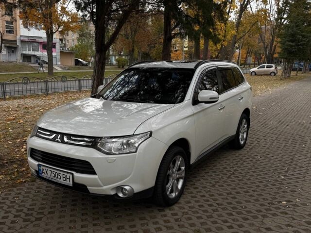 Белый Мицубиси Аутлендер, объемом двигателя 2.4 л и пробегом 146 тыс. км за 13500 $, фото 2 на Automoto.ua