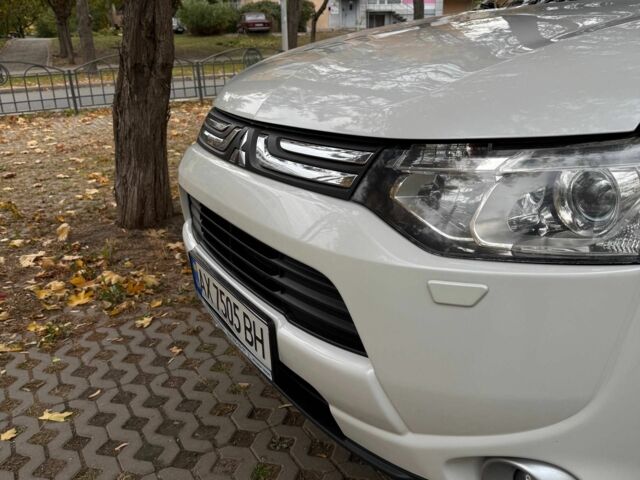 Белый Мицубиси Аутлендер, объемом двигателя 2.4 л и пробегом 146 тыс. км за 13500 $, фото 8 на Automoto.ua