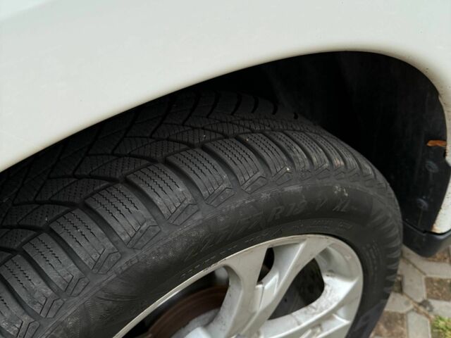 Белый Мицубиси Аутлендер, объемом двигателя 2.4 л и пробегом 146 тыс. км за 13500 $, фото 6 на Automoto.ua