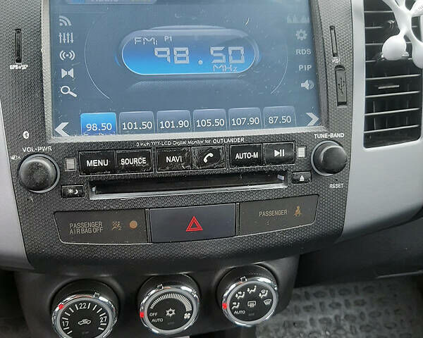 Белый Мицубиси Аутлендер, объемом двигателя 2.4 л и пробегом 63 тыс. км за 13800 $, фото 11 на Automoto.ua